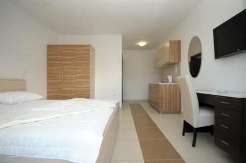 Postel nebo postele na pokoji v ubytování Apartments Anita
