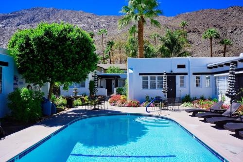 The swimming pool at or near AMIN CASA PALM SPRINGS