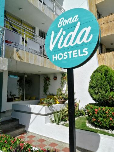 a sign for bonanza villa hotels in front of a building at Bona Vida Hotel in Ríohacha