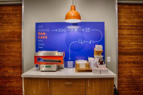 a table with a blue board with auclearuclearuclear at Holiday Inn Express - Lockport by IHG in Lockport