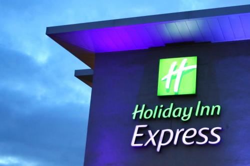 a building with a holiday inn express sign on it at Holiday Inn Express Birmingham Redditch by IHG in Redditch