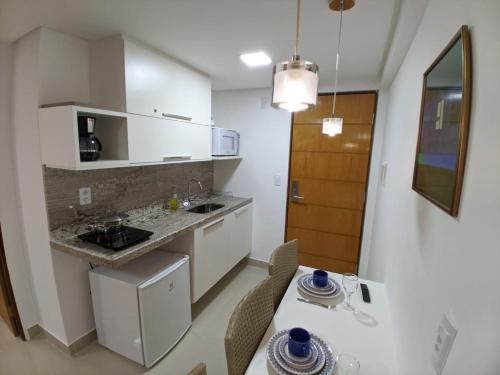 Virtuvė arba virtuvėlė apgyvendinimo įstaigoje Gold Flat - Praia do Cabo Branco