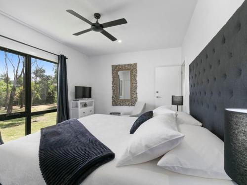 Ένα ή περισσότερα κρεβάτια σε δωμάτιο στο Campania Spa Suite 2