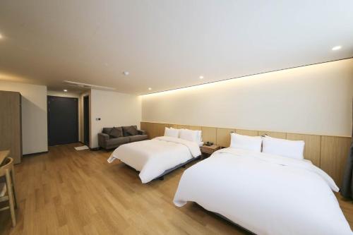 Cama o camas de una habitación en Benikea hotel