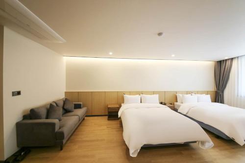 Cama o camas de una habitación en Benikea hotel