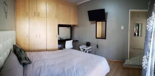 Katil atau katil-katil dalam bilik di TwinnPalms Accommodation