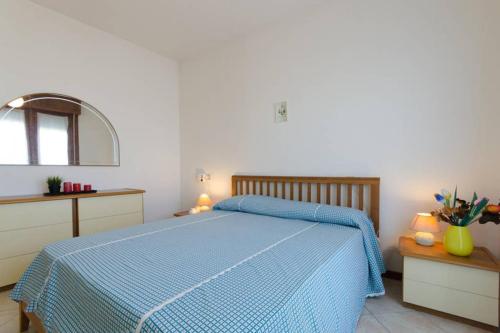 Postel nebo postele na pokoji v ubytování Cortina 2-22