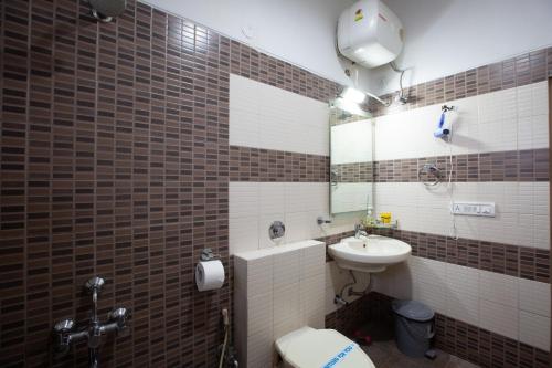 Ένα μπάνιο στο KSTDC Hotel Mayura Valley View Madikeri