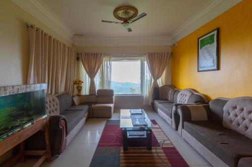 Μια τηλεόραση ή/και κέντρο ψυχαγωγίας στο KSTDC Hotel Mayura Valley View Madikeri