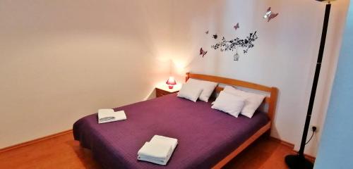 Posteľ alebo postele v izbe v ubytovaní Apartments Đogo