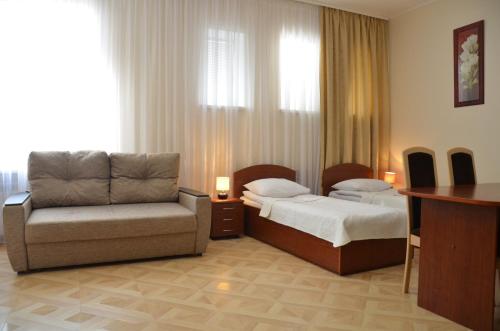 Llit o llits en una habitació de Отель "Евразийский"