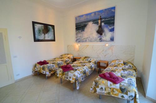 a living room with couches and chairs in a room at La Marina in Ancona
