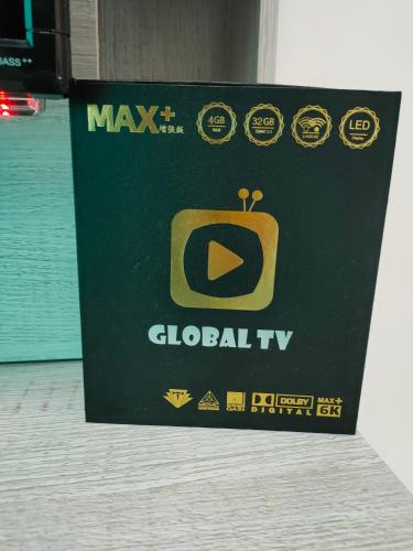 a card with a picture of a green box with a gold tv at Lake Residence No165 @aesthetic lake view & best photograph in Puchong