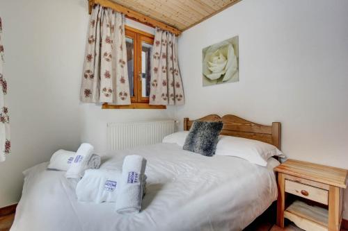 Postel nebo postele na pokoji v ubytování Arthur Chalet - Snow and Trek - Morzine centre