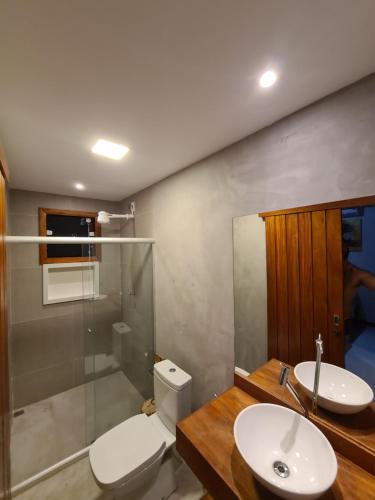 Um banheiro em Taipu Beach House - Barra Grande