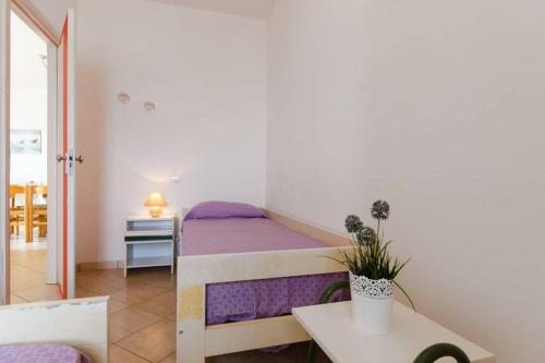 Postel nebo postele na pokoji v ubytování Cortina 2-34