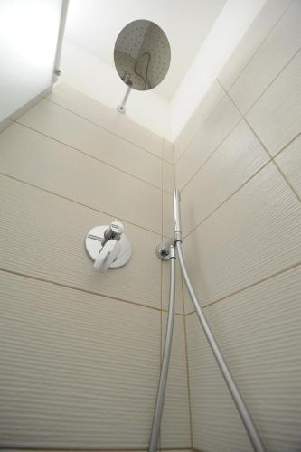 a shower in a bathroom with a shower at La Marina in Ancona