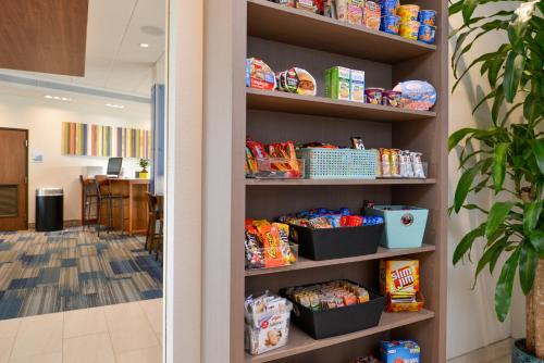 a pantry filled with lots of food and snacks at Holiday Inn Express & Suites Trinity by IHG in Trinity