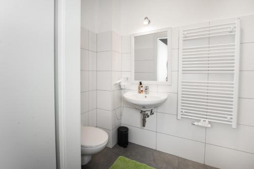 Koupelna v ubytování Dalila Appartements