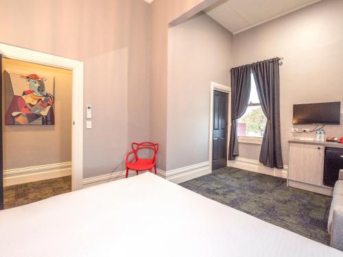 Postel nebo postele na pokoji v ubytování Telegraph Hotel Numurkah