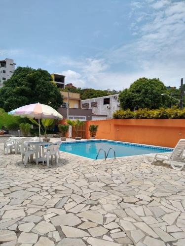 Pousada Sol do Araçáの敷地内または近くにあるプール