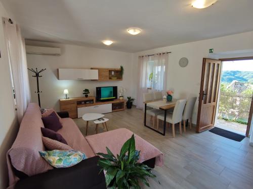 Posezení v ubytování Jasmina Apartment