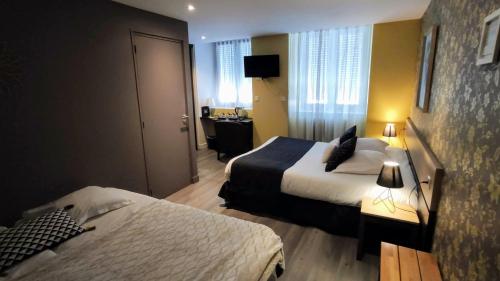 Ένα ή περισσότερα κρεβάτια σε δωμάτιο στο Celtic Hotel