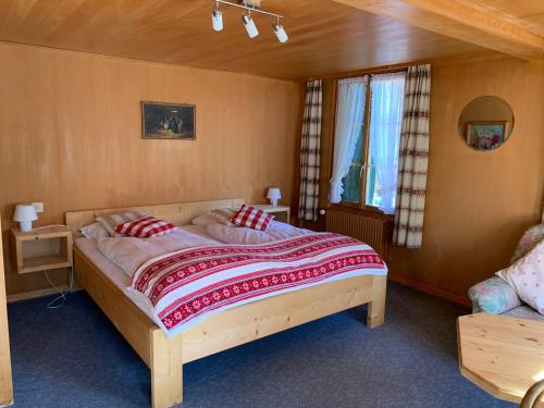 Postel nebo postele na pokoji v ubytování Hotel Wildhorn
