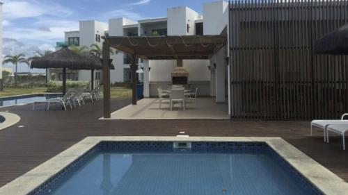 สระว่ายน้ำที่อยู่ใกล้ ๆ หรือใน Apartamento em Condominio de Luxo - Iberostar- Praia Do Forte