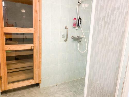 Baðherbergi á Cozy apartment with sauna