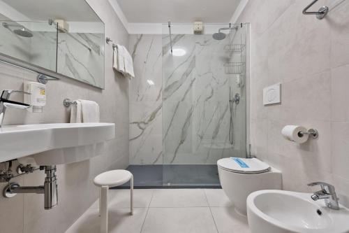 Ванная комната в Hotel Croce Di Malta
