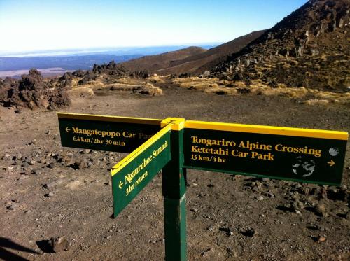 a sign at the top of a mountain at Parkview Apartments in National Park