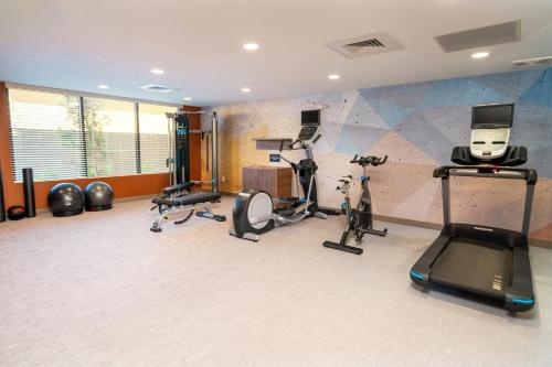 a gym with several exercise equipment in a room at Candlewood Suites - Las Vegas - E Tropicana by IHG in Las Vegas