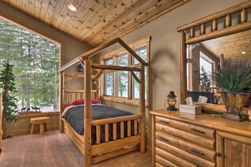 a bedroom with a bunk bed in a house at Expansive Ruth Lake Home with Dock, Fire Pit and Beach in Emily