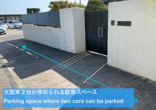 a parking space where two cars can be parked at Luxury ocean front house Bay-villa in Matsushima