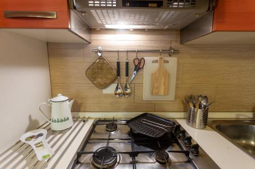 Kuchyň nebo kuchyňský kout v ubytování casa vacanze asia