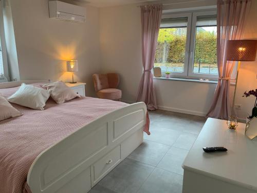 Cama ou camas em um quarto em Ferienwohnung Gartenstadt