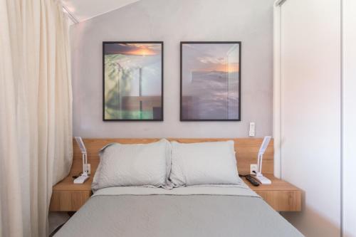 Ein Bett oder Betten in einem Zimmer der Unterkunft Flat Extra Oka Beach Residence Muro Alto