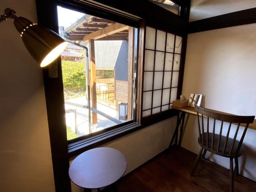Un balcón o terraza de Guesthouse Nedoko