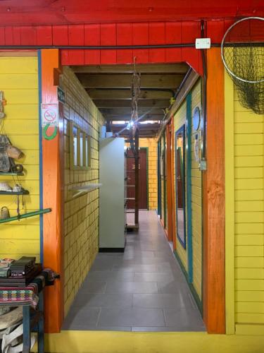 a hallway of a building with a basketball hoop at Hostel Encantadas Ecologic in Ilha do Mel