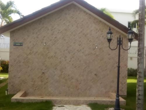 a building with a street light next to it at Luxury in the Caribbean in Sosúa