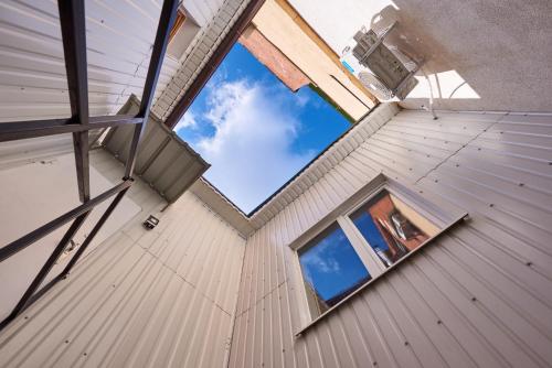 a view from the inside of a house with a window at New Historical Museum Apartment in Kharkiv