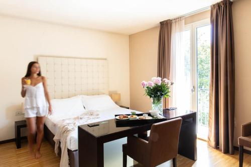 Postel nebo postele na pokoji v ubytování Sweet Hotel