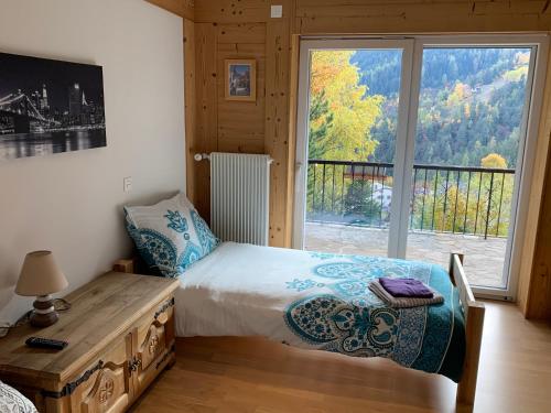Postel nebo postele na pokoji v ubytování Chalet Belmont
