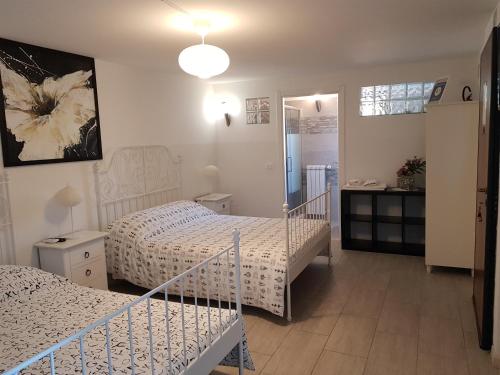 A bed or beds in a room at La Culla del Conte
