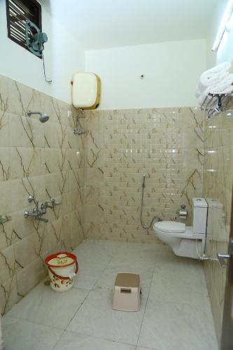 Koupelna v ubytování Maharaja Homestay