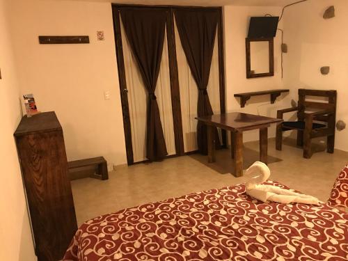 Cama ou camas em um quarto em San Ángel Atlixco