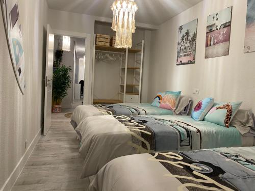 A bed or beds in a room at Enjoy Ávila -LA CATEDRAL