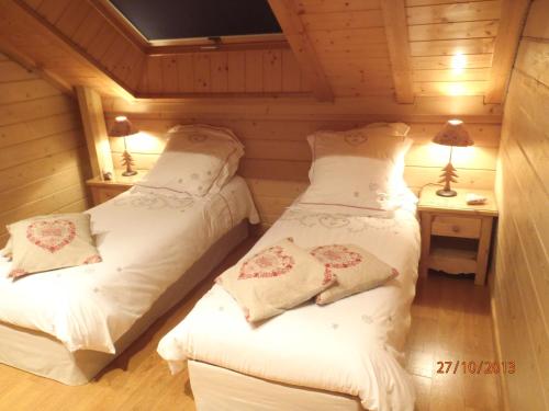 Krevet ili kreveti u jedinici u objektu Le Chalet du Pont des Fées - Sauna & SPA