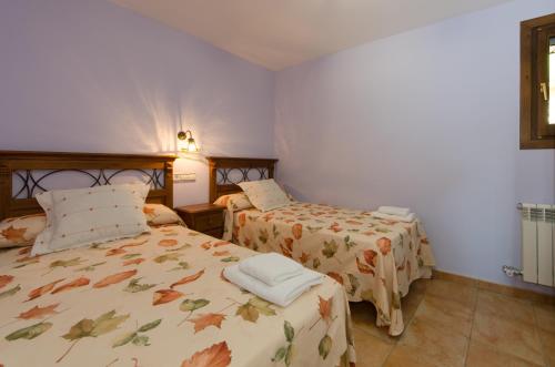 Postel nebo postele na pokoji v ubytování Casa Soltero Apartamentos